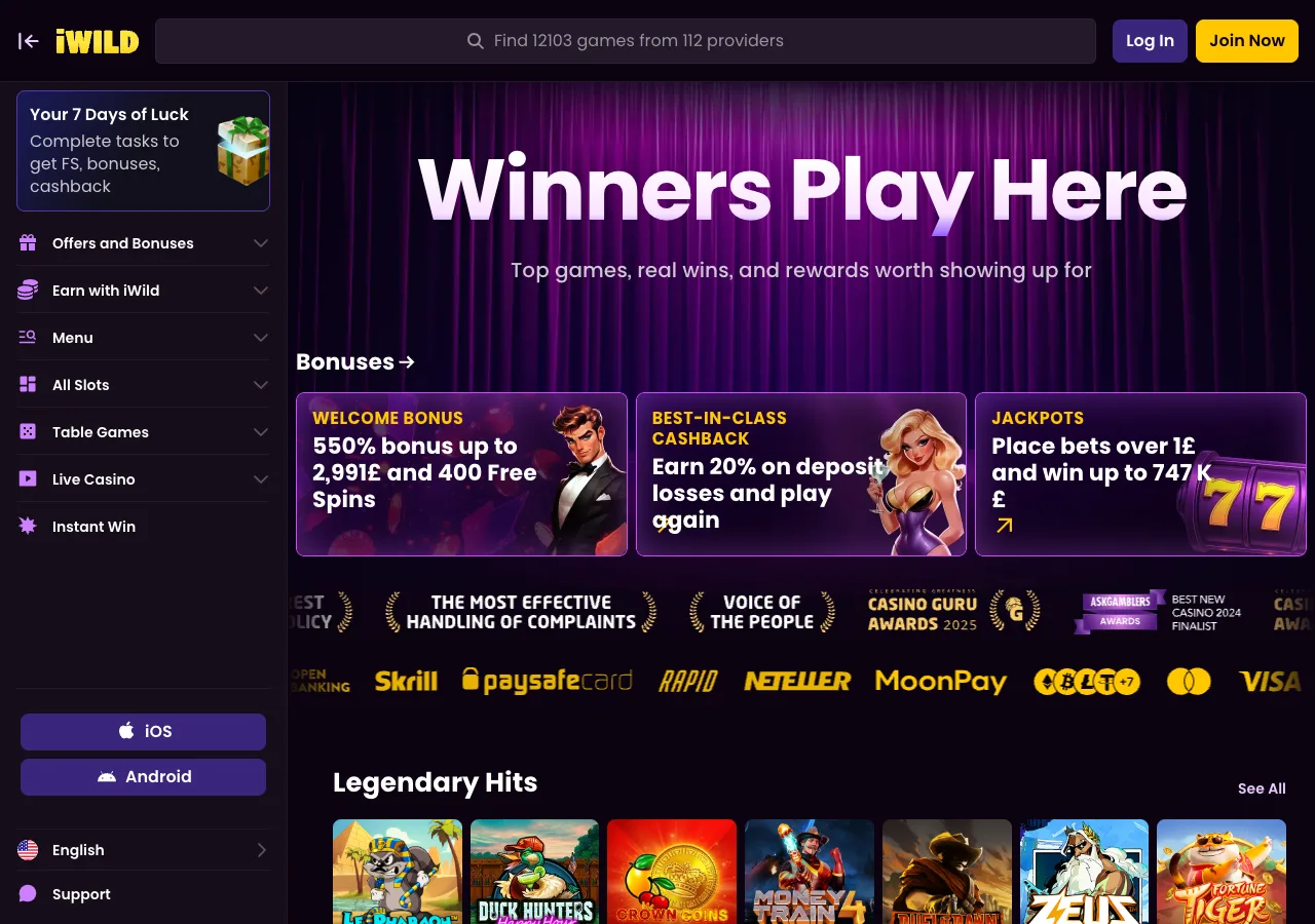iWild Casino lobby showing the welcome bonus, cashback and awards banners